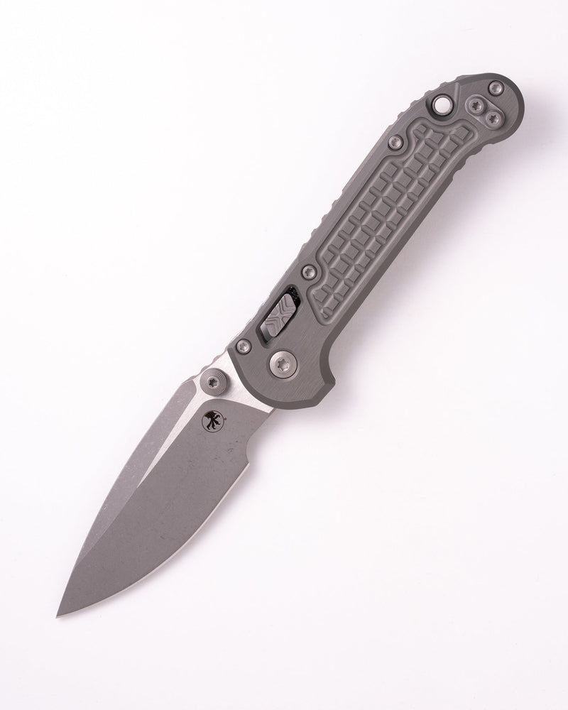 Microtech L.U.D.T RAM-LOK S/E APOCALYPTIC FRAG PATTERN ALUMINIUM NATURAL CLEAR Gray Aluminum (3.50" Bohler M390MK stainless) Folding Knife [1135RL-10APFRNC] - product view 3